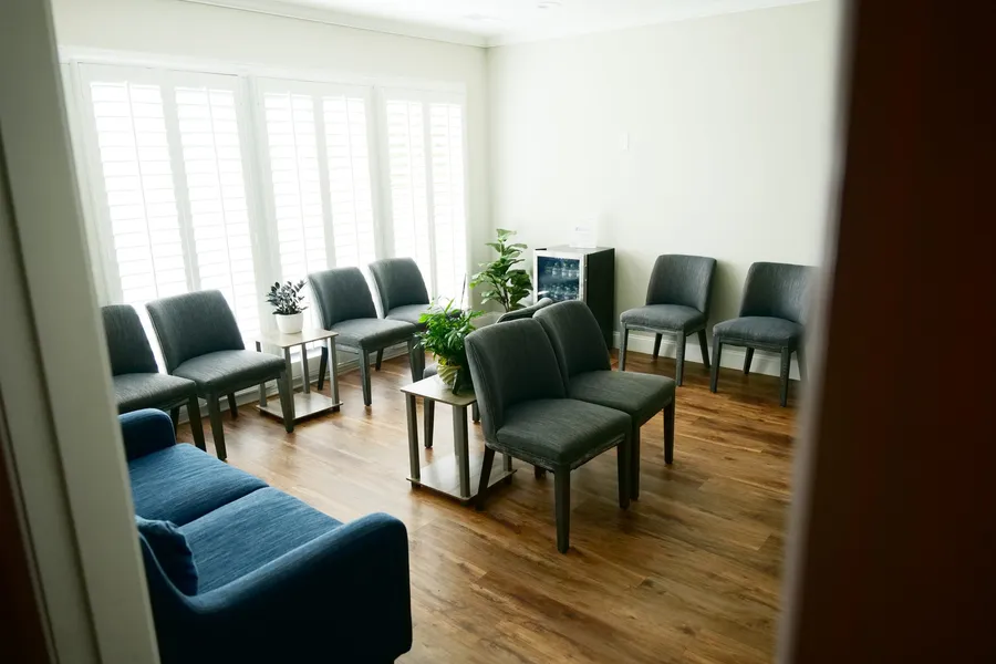 Seating in the downstairs waiting area at Wellspring Counseling
